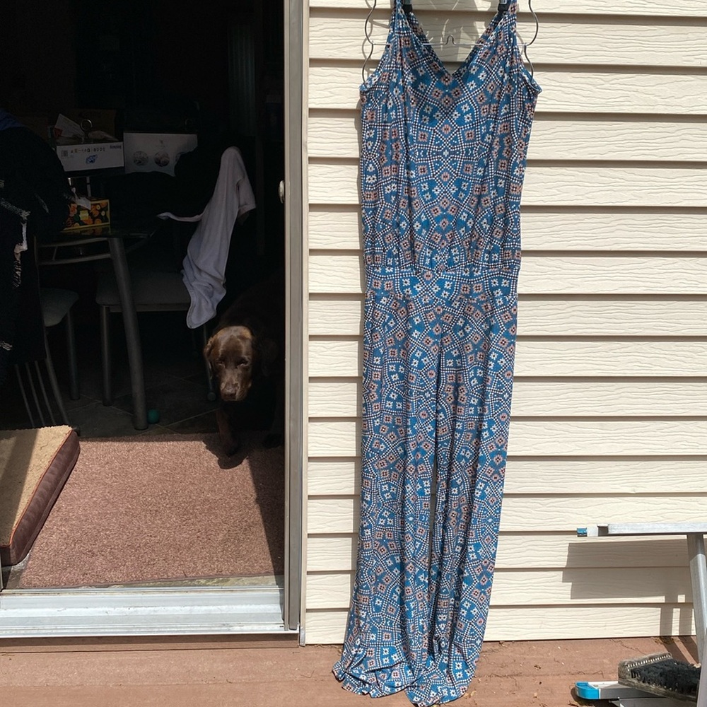 Cute print spaghetti strap jumpsuit. Size L . Flare wide leg . Stretchy fabric.